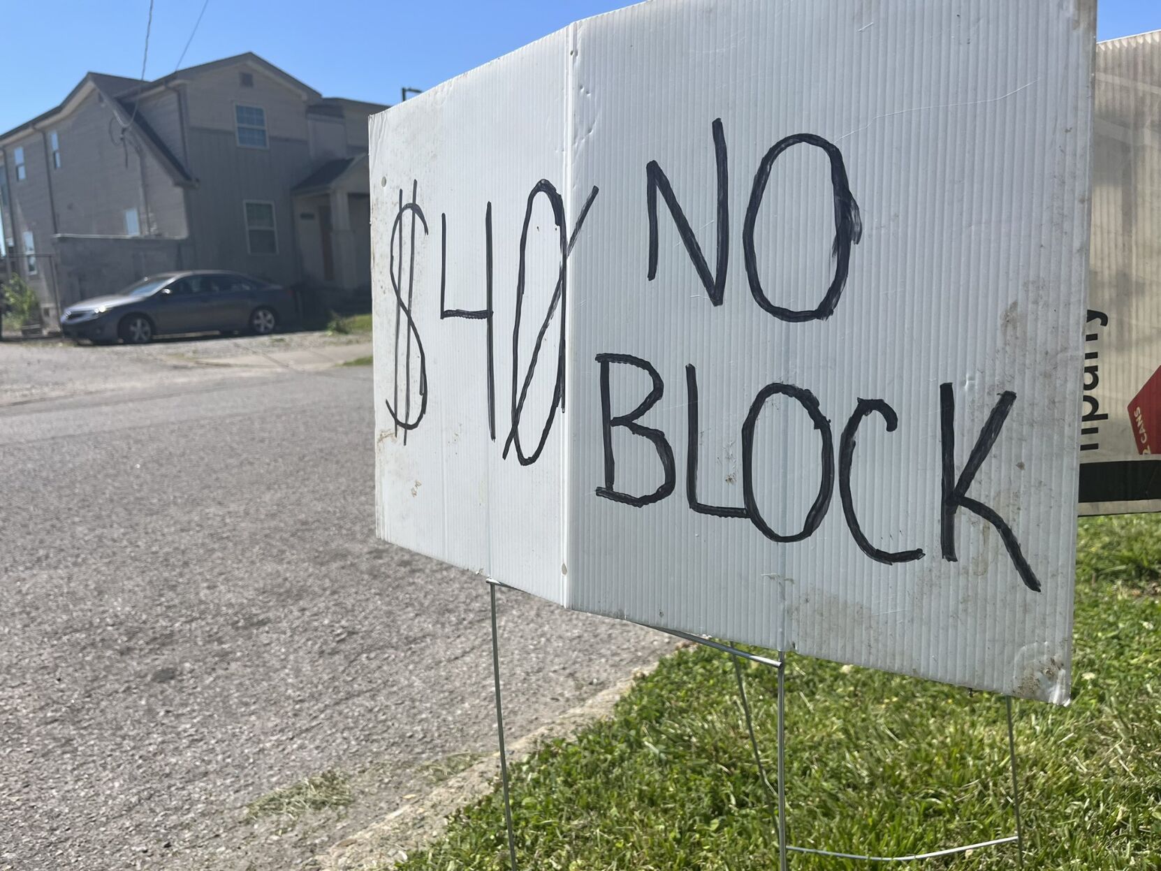 Parking crunch helped by neighbors, shuttles near Churchill Downs for Derby weekend